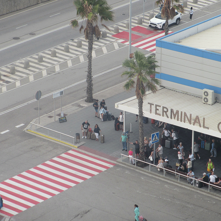 top view of the corner of a building with a sign reading: terminal