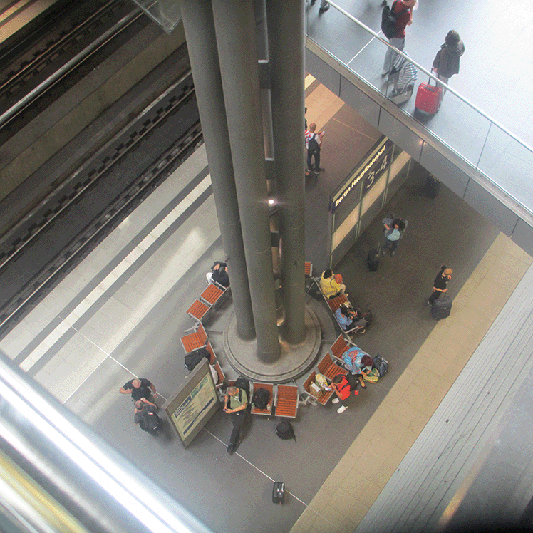 Round bench at Berlin train station shot from above