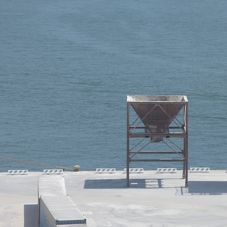 big sand funnel at a harbor